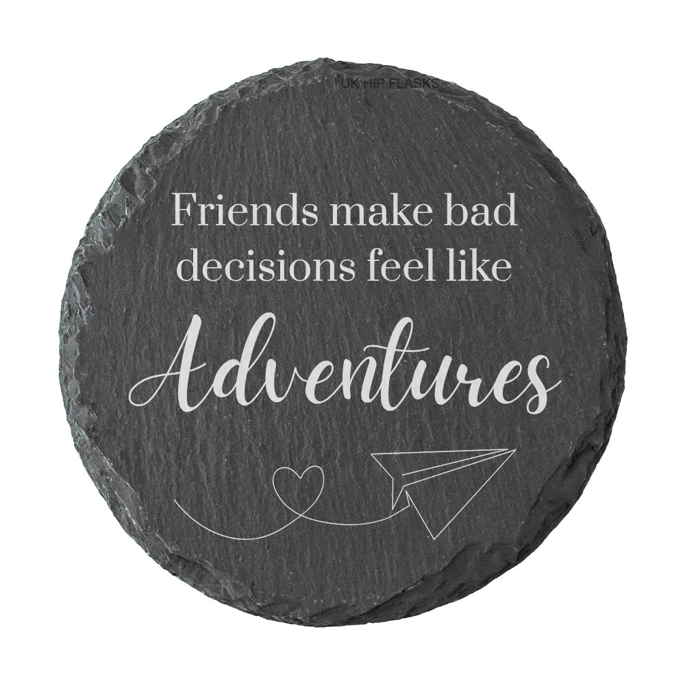 Round slate coaster with humorous quote on a white background
