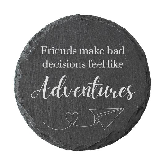Round slate coaster with humorous quote on a white background