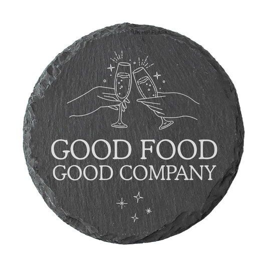 A round slate coaster with the quote "Good food good company" in white text.