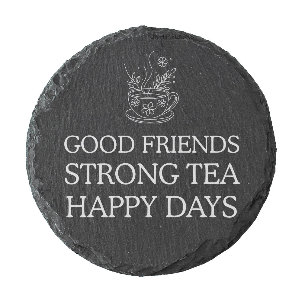 Round slate coaster with tea cup design and text 'Good friends strong tea happy days' on a white background