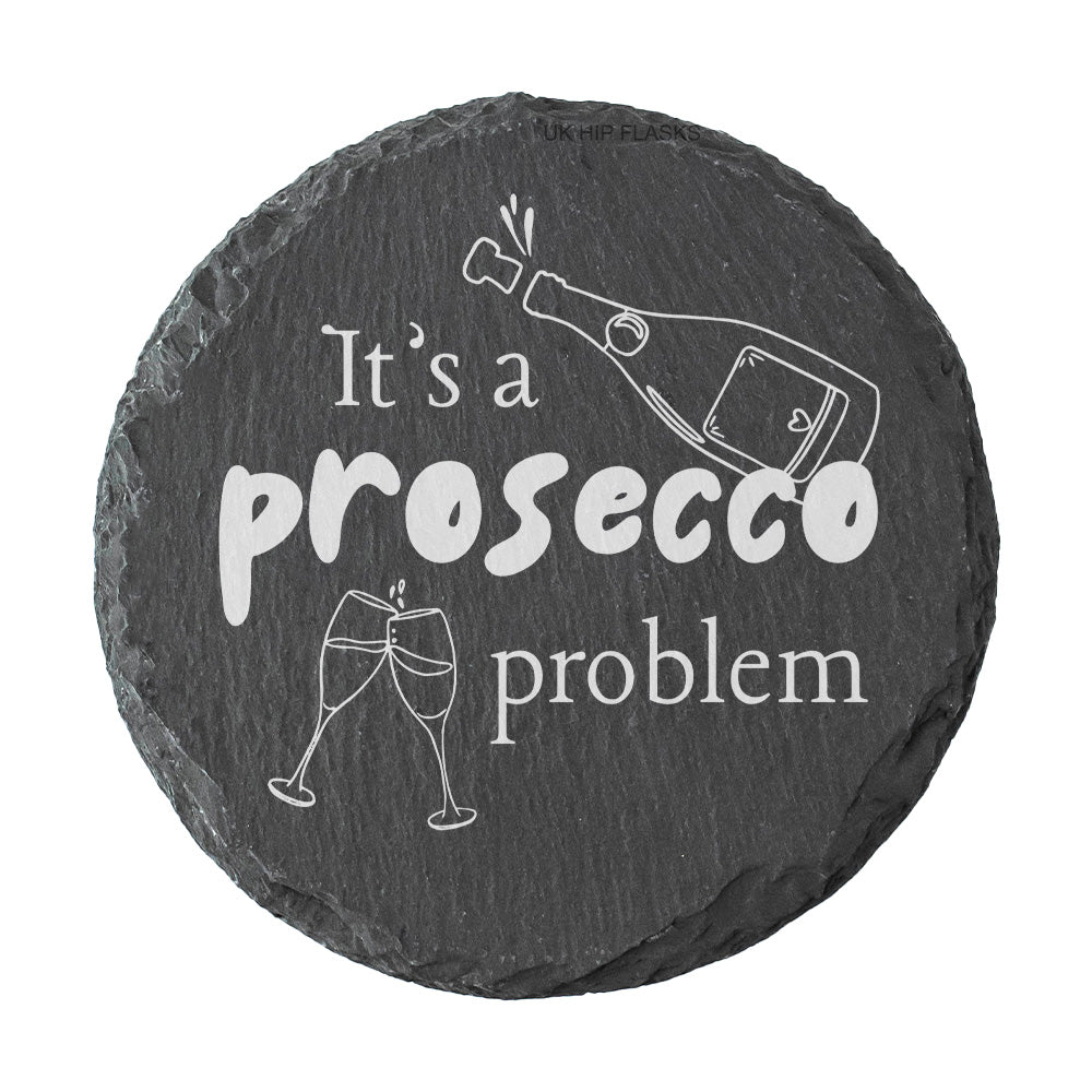 Round slate coaster with 'It's a prosecco problem' text and graphics on a white background