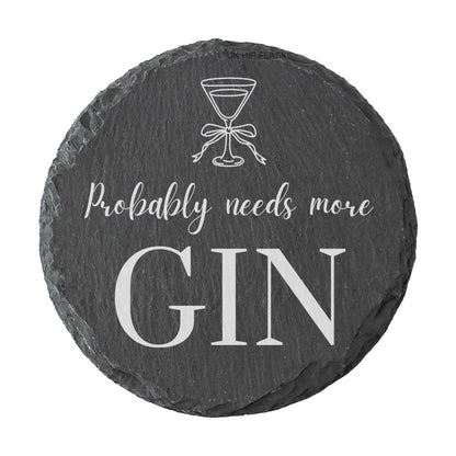 Round slate coaster with 'Probably needs more Gin' text and martini glass design.