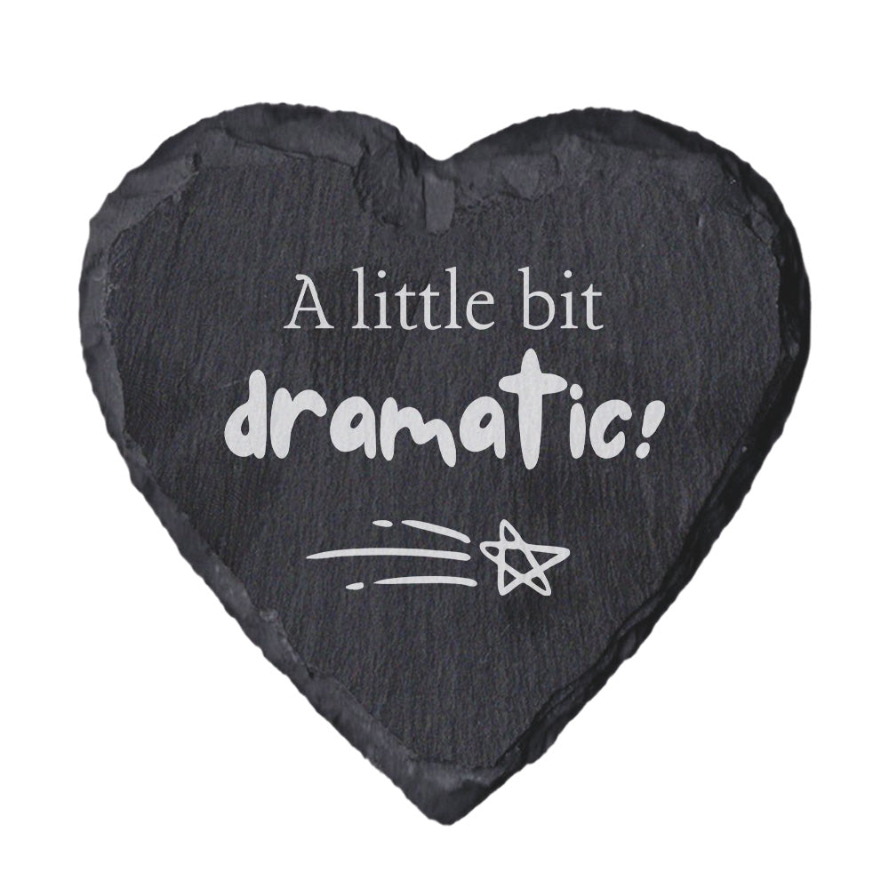 Heart-shaped slate coaster with 'A little bit dramatic!' text on a white background