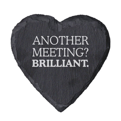 Heart-shaped slate with text 'ANOTHER MEETING? BRILLIANT.' on a white background