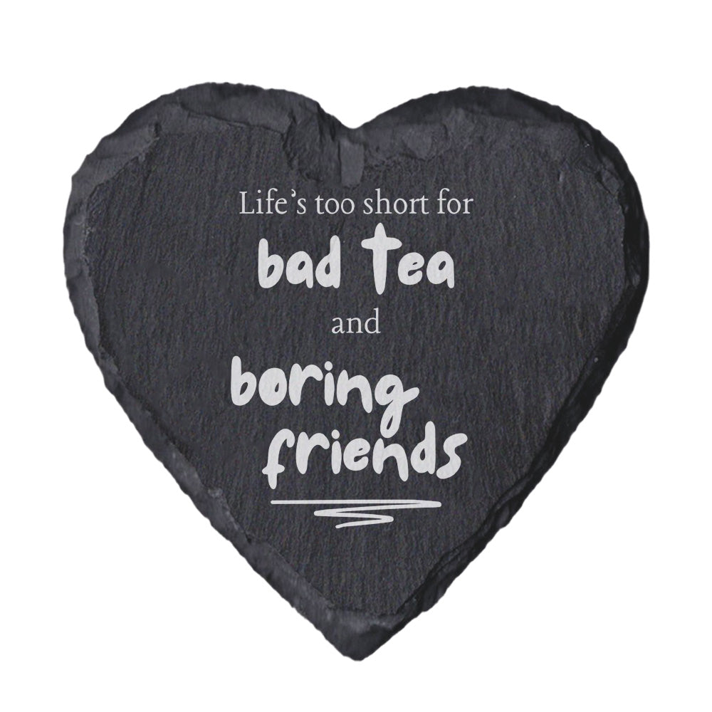 Heart-shaped slate coaster with motivational quote on a white background