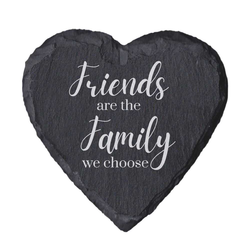 Heart-shaped slate coaster with 'Friends are the family we choose' text on a white background