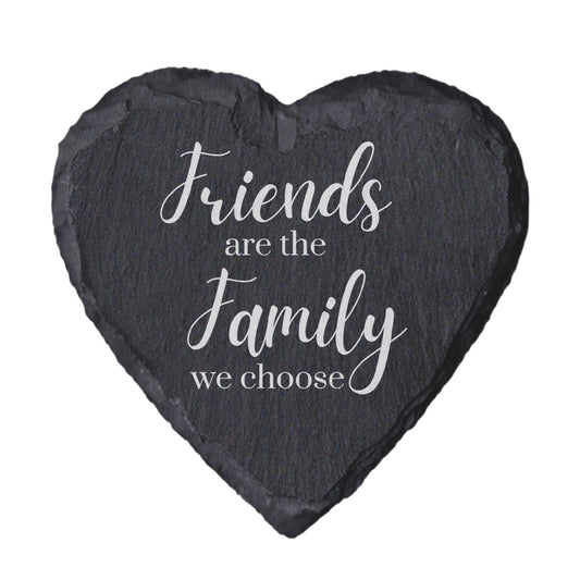 Heart-shaped slate coaster with 'Friends are the family we choose' text on a white background