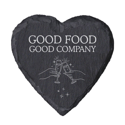 Heart-shaped slate coaster with 'Good Food Good Company' text and champagne glass design.