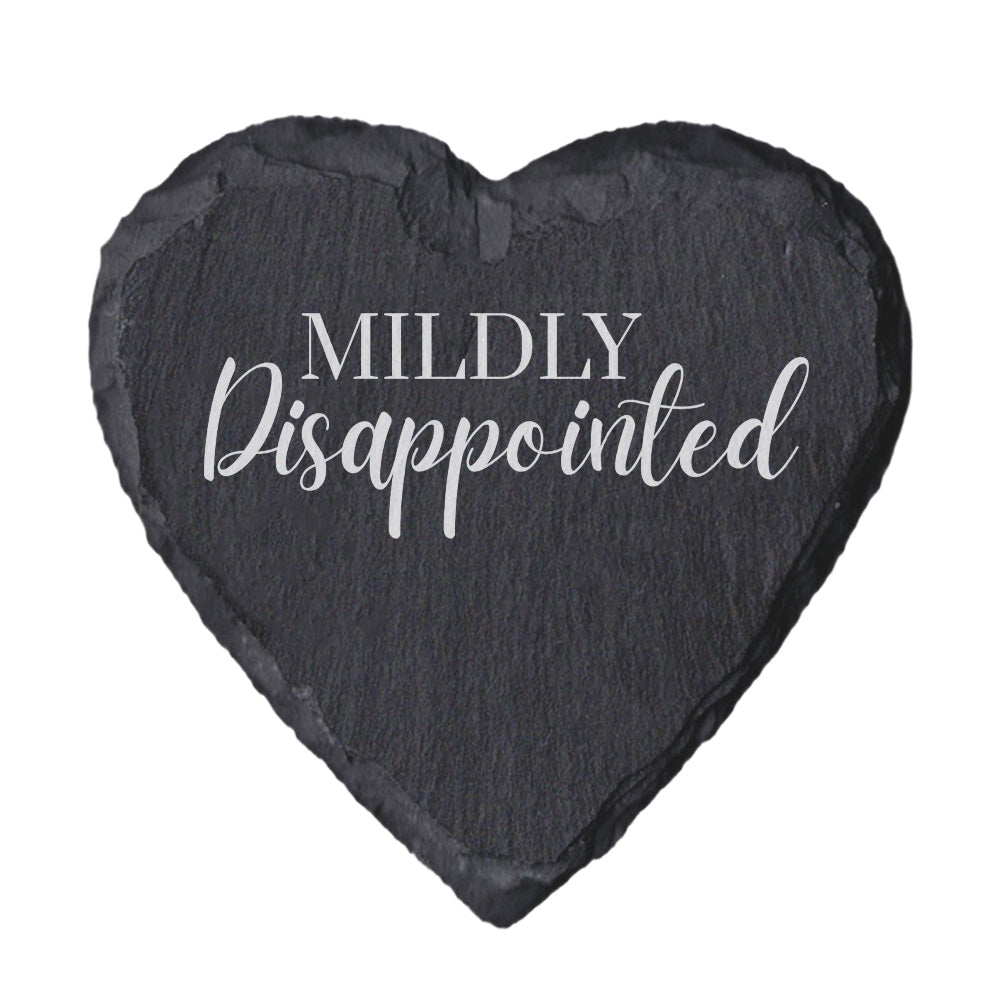 Heart-shaped slate coaster with 'Mildly Disappointed' text on a white background