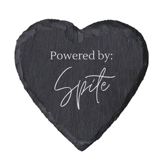 Heart-shaped slate coaster with 'Powered by: Spite' text on a white background