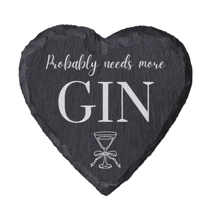 Heart-shaped slate coaster with 'Probably needs more Gin' text and martini glass illustration on a white background.