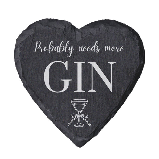 Heart-shaped slate coaster with 'Probably needs more Gin' text and martini glass illustration on a white background.