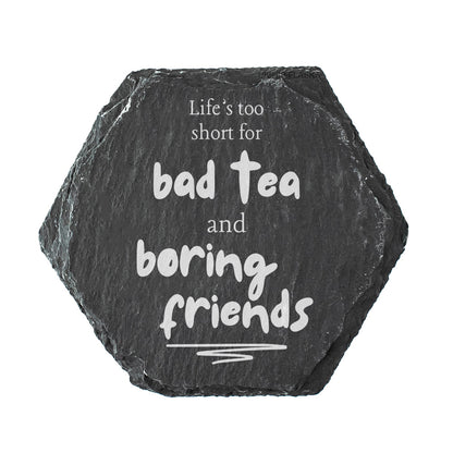 Hexagonal slate coaster with humorous friendship quote on a white background