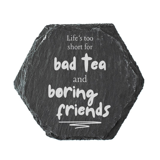 Hexagonal slate coaster with humorous friendship quote on a white background