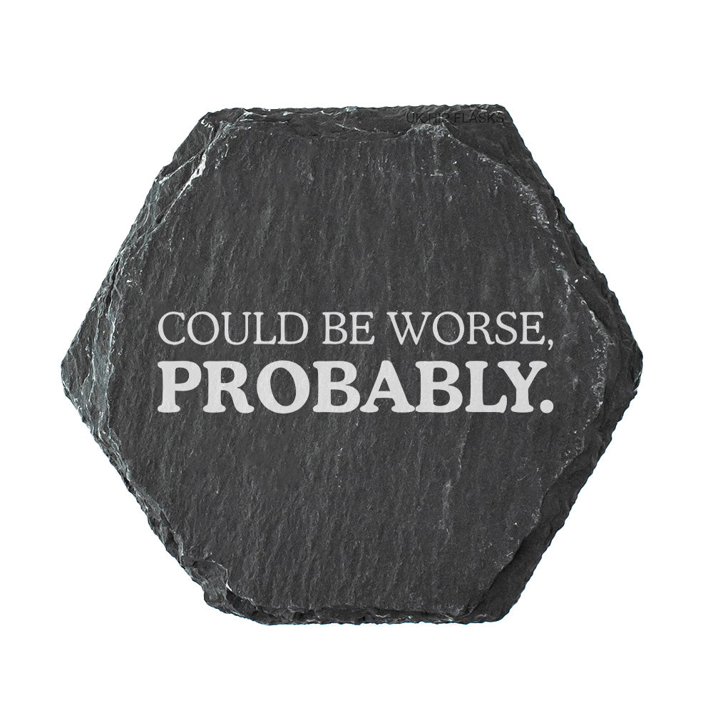 Hexagonal black slate coaster with 'Could be worse, probably.' text on a white background
