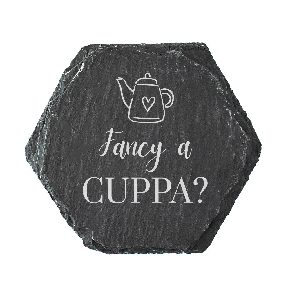 Hexagonal slate coaster with teapot illustration and text 'Fancy a CUPPA?' on a white background