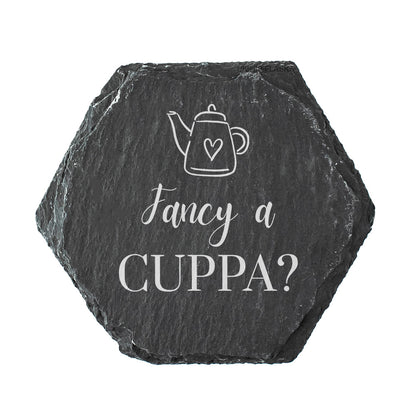 Hexagonal slate coaster with teapot illustration and text 'Fancy a CUPPA?' on a white background