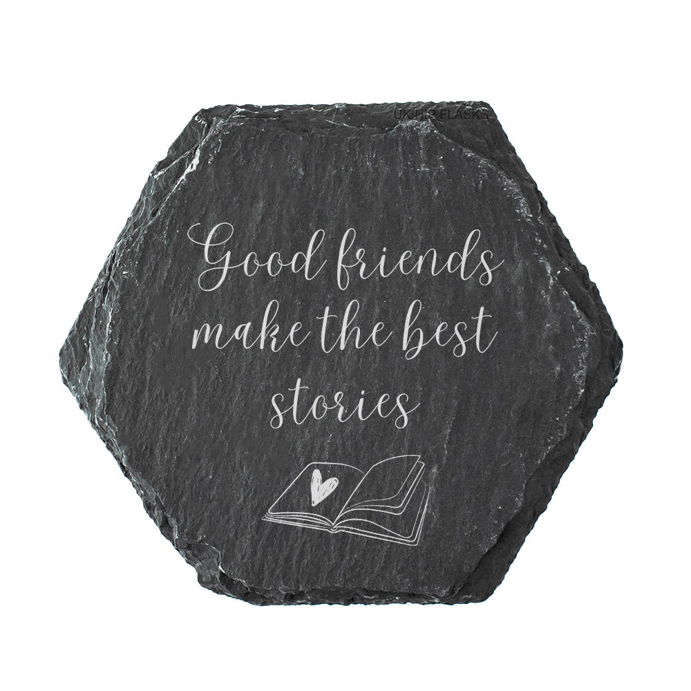 A hexagon slate coaster with the quote "good friends make the best stories" in white text.