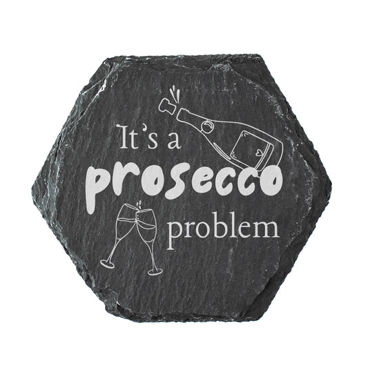 Hexagonal slate coaster with 'It's a prosecco problem' text and prosecco bottle illustration on a white background