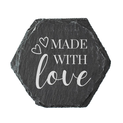 Hexagonal slate coaster with the quote "made with love" in white text.