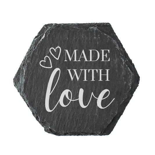 Hexagonal slate coaster with the quote "made with love" in white text.