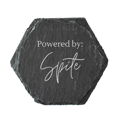 Hexagonal black slate coaster with 'Powered by Spite' text on a white background