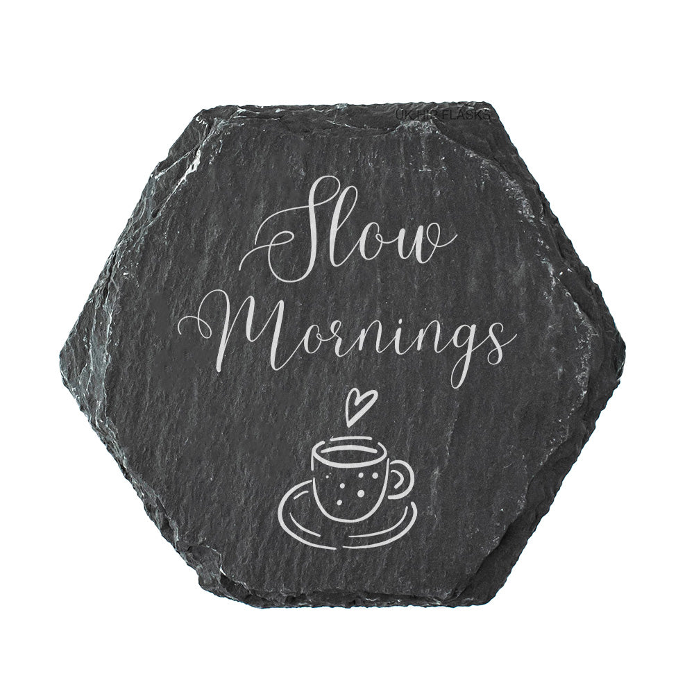 Hexagonal slate coaster with 'Slow Mornings' and a coffee cup design on a white background