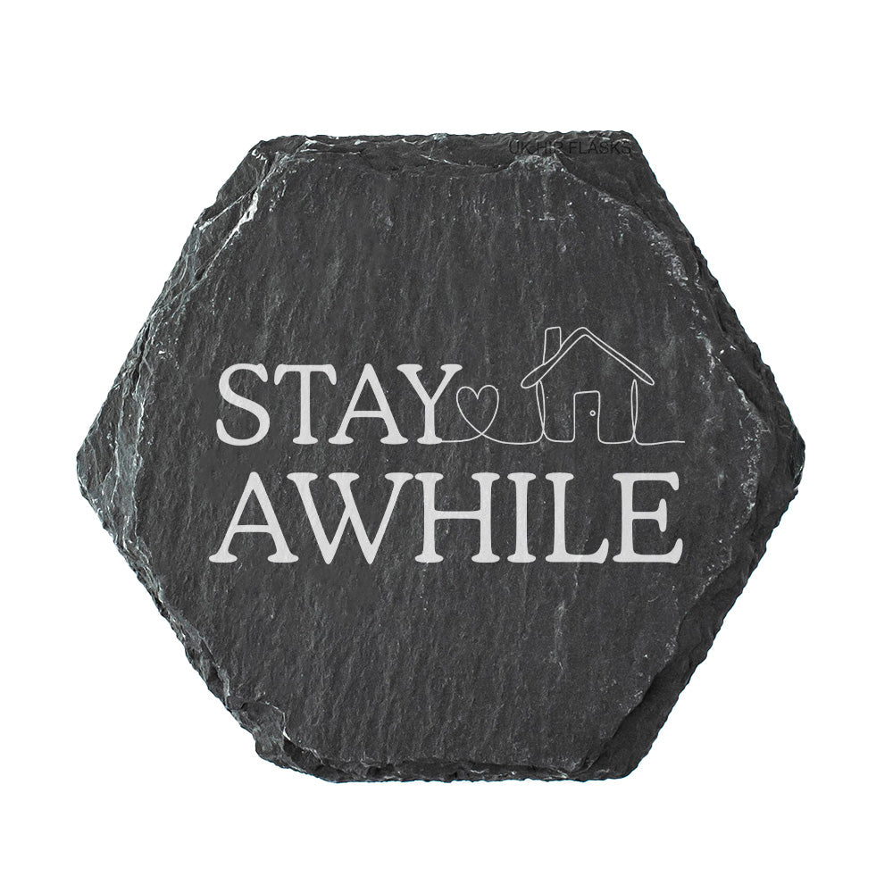 Hexagonal slate coaster with 'Stay Awhile' in white text.
