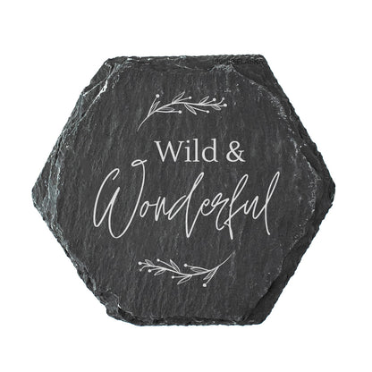 Hexagonal slate coaster with 'Wild & Wonderful' text on a white background