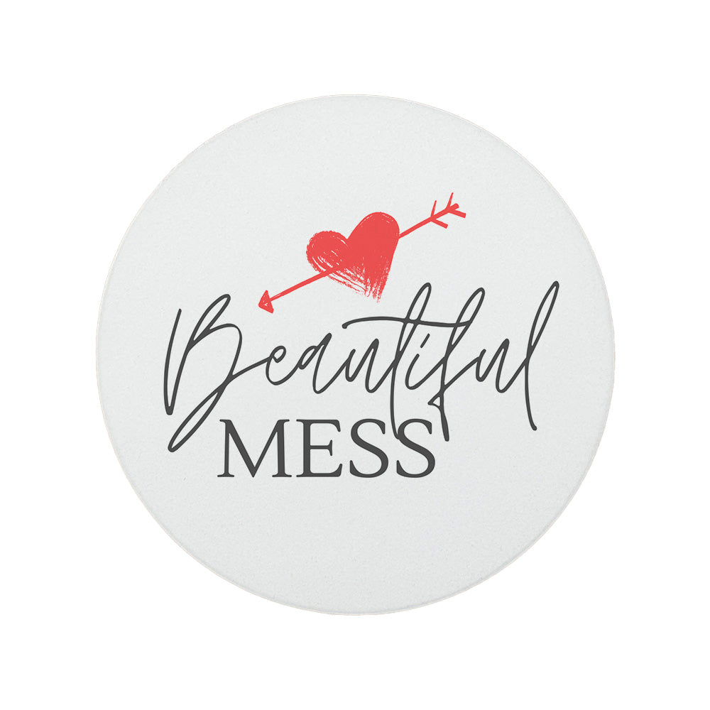 Round ceramic coaster with the quote "Beautiful Mess" in black and red text. 