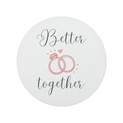 Round ceramic coaster with the quote "Better Together" in black and red text, with a wedding ring illustration.