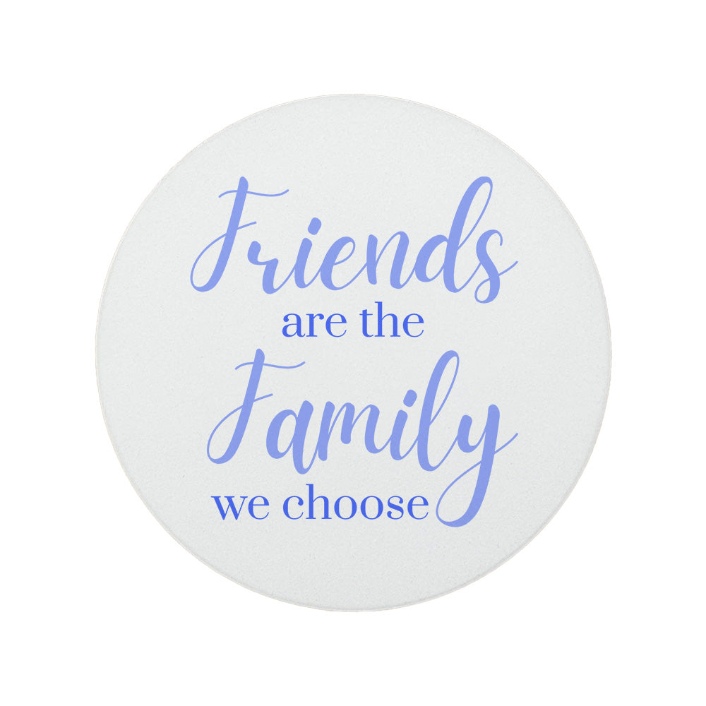 Round ceramic coaster featuring the thoughtful quote "Friends are the family we choose" in crisp lilac lettering.