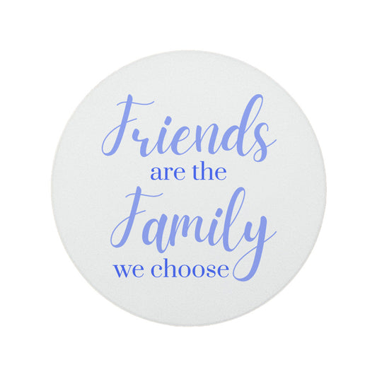 Round ceramic coaster featuring the thoughtful quote "Friends are the family we choose" in crisp lilac lettering.