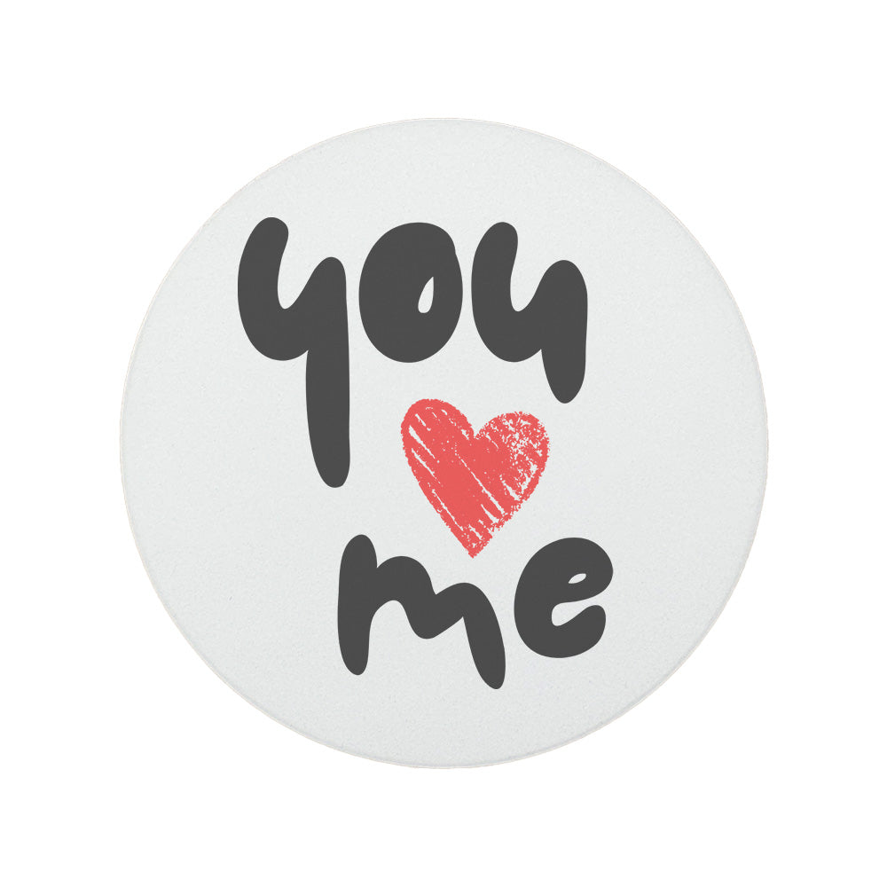 Round ceramic coaster featuring the quote "You 'heart' Me" in grey and red lettering. 