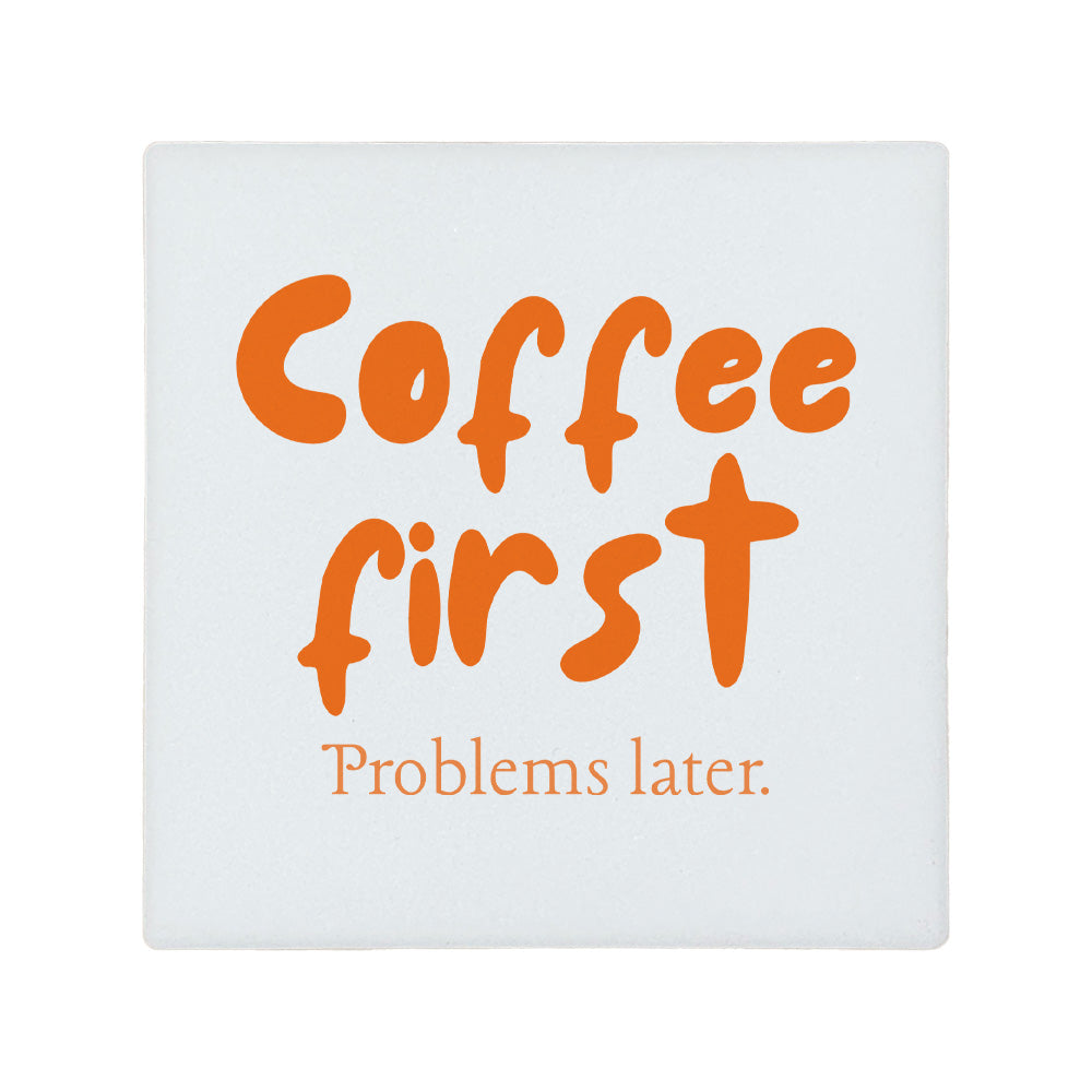 Square ceramic coaster featuring the humorous sarcastic quote "Coffee first, problems later." in crisp orange lettering. 