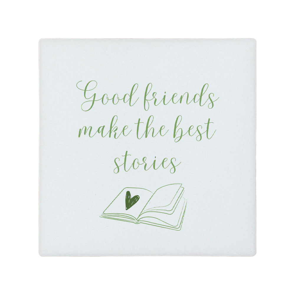 Square ceramic coaster featuring the friendship quote "Good friends make the best stories" in crisp green lettering with a book illustration underneath.