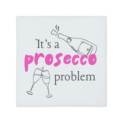 Square ceramic coaster featuring the humorous quote "It's a prosecco problem" in crisp pink lettering. 