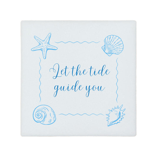 Square ceramic coaster featuring the inspirational quote "Let the tide guide you" in elegant blue lettering with sea shell illustrations.