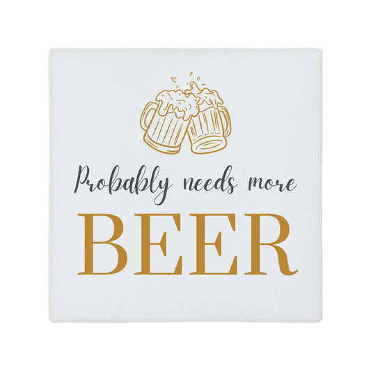 Square ceramic coaster featuring the funny quote "Probably needs more beer" in crisp grey and gold lettering with a beer glasses illustration. 