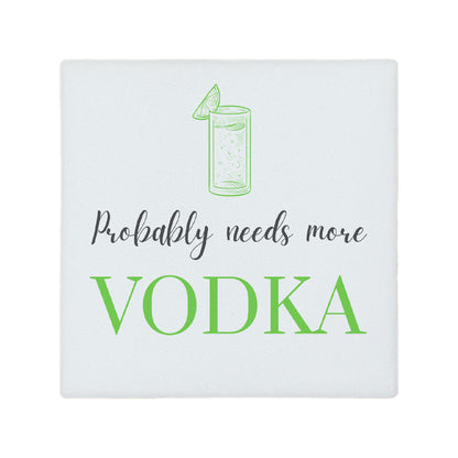Square ceramic coaster featuring the funny quote "Probably needs more vodka" in crisp grey and green lettering with a vodka tonic glass illustration.