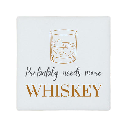 Square ceramic coaster featuring the funny quote "Probably needs more whiskey" in crisp grey and brown lettering with a whiskey glass illustration.