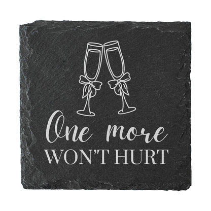 Slate coaster with champagne glasses and text 'One more won't hurt' on a white background