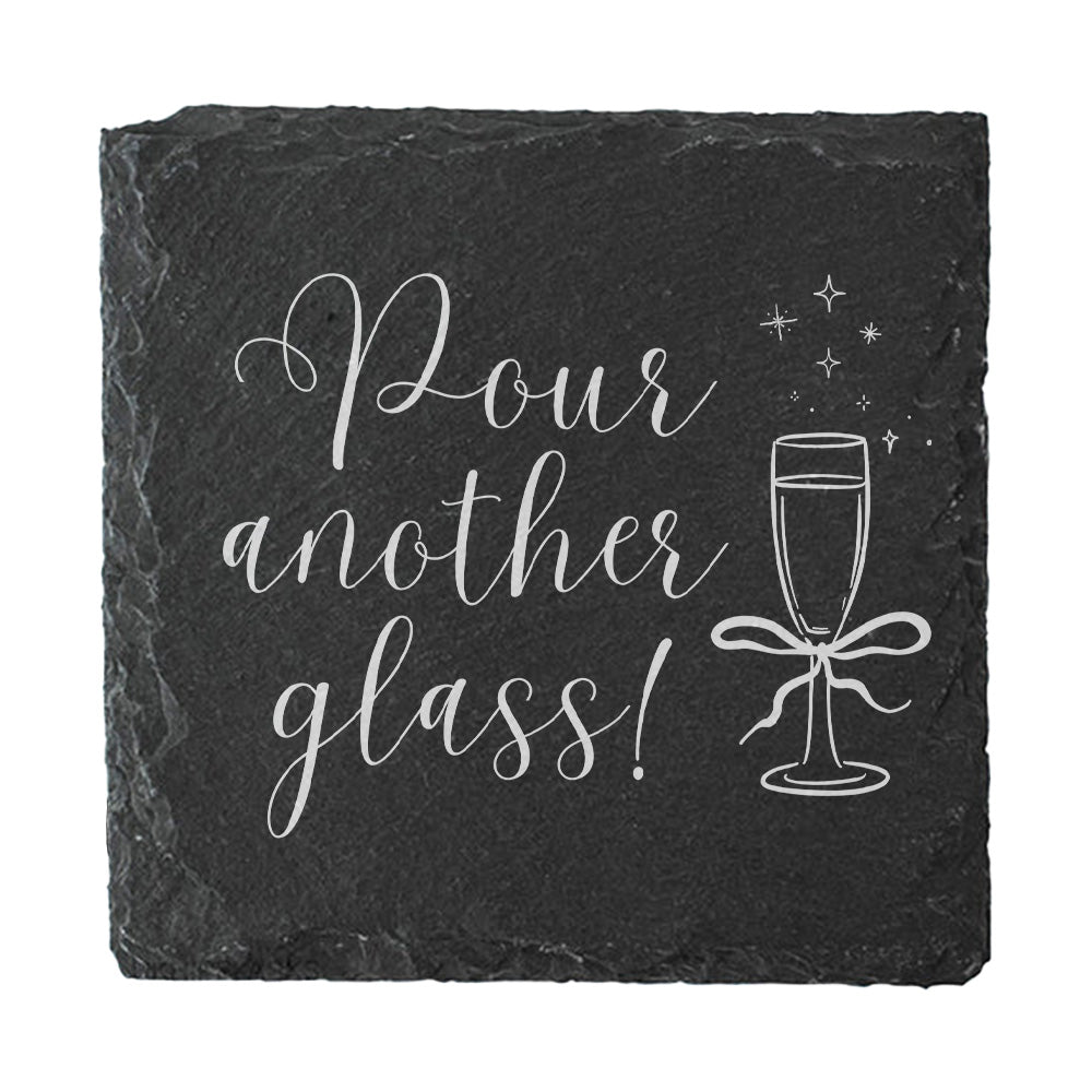 Slate coaster with 'Pour another glass!' text and prosecco glass illustration on a white background