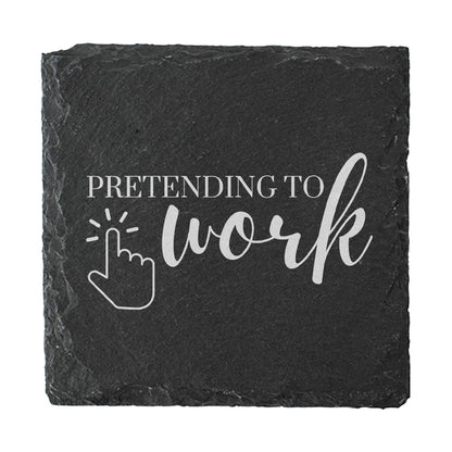 Slate coaster with 'Pretending to work' text and cursor icon on a white background