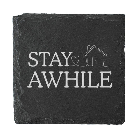 Slate coaster with 'Stay Awhile' text and house heart design on a white background