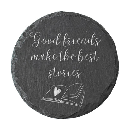 Round slate coaster with 'Good friends make the best stories' text and a heart on a white background