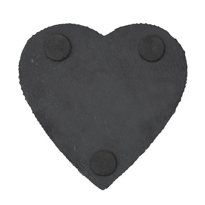 Heart-shaped slate coaster with foam feet on the back to protect worksurfaces.