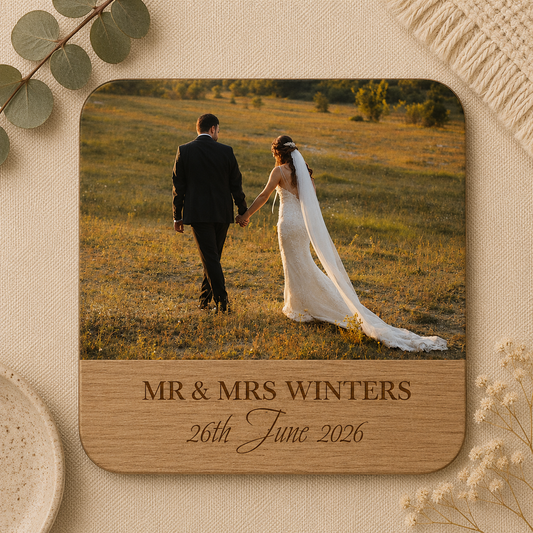 Personalised photo coaster of a wedding couple holding hands in a field with personalised names and date.