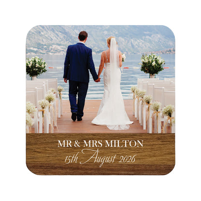 Personalised wedding photo coaster with custom name and date text.